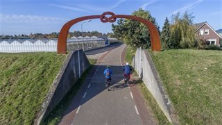 Dijkverhoging en kassen