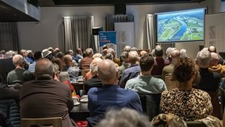 Presentatie tijens bijeenkomst