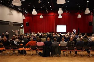 Presentatie tijdens informatiebijeenkomst