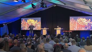 Een presentatie aan genodigde